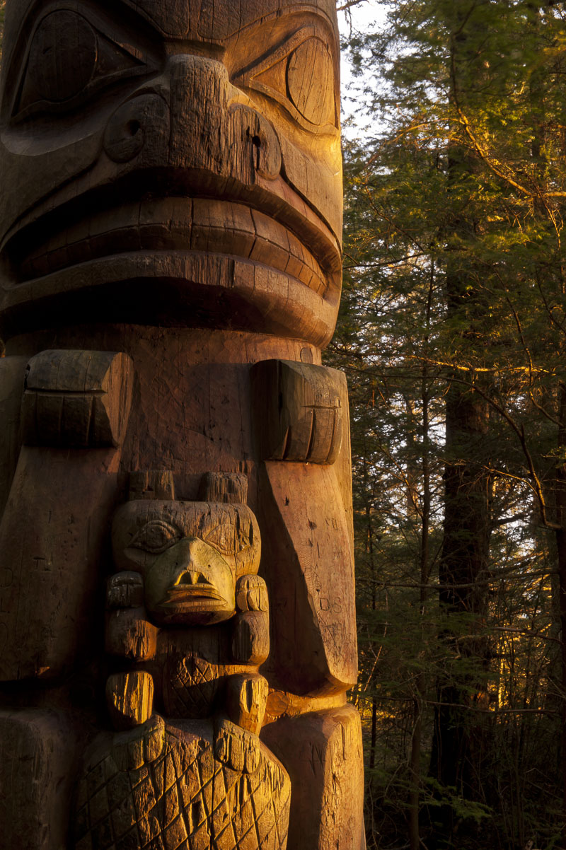 A totem catches some evening light at the Sitka National Historic Park in Sitka, Alaska.
