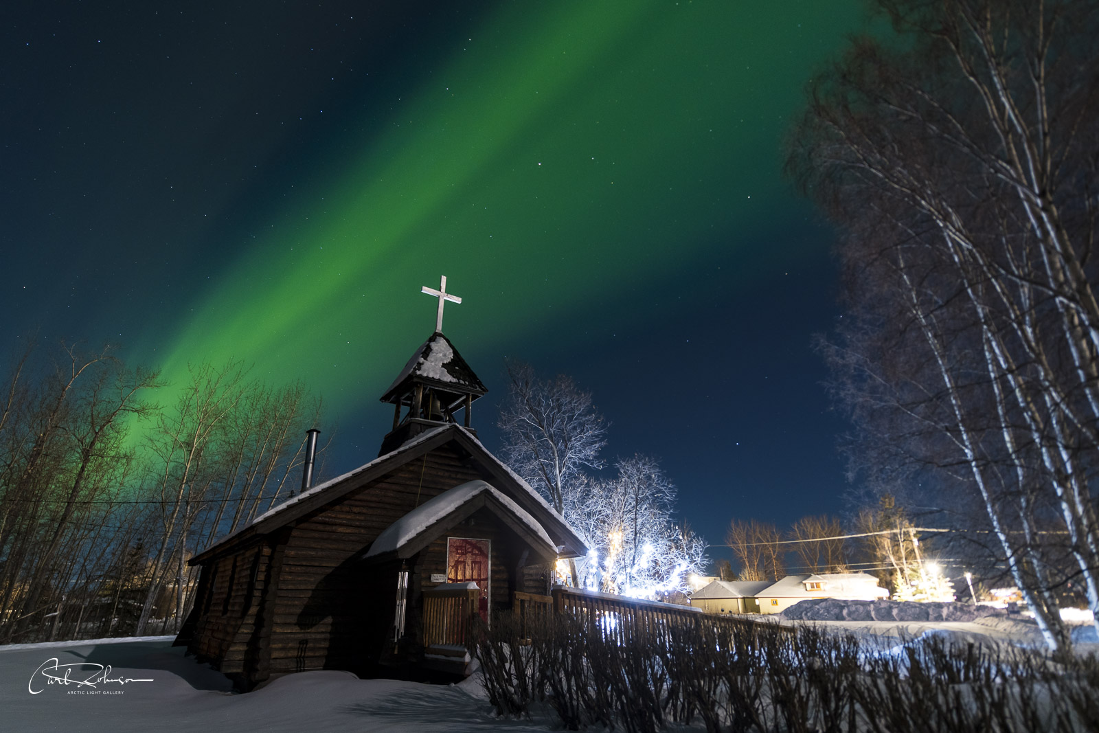 The aurora borealis soars over St. Mark's Episcopal Church in Nenana.