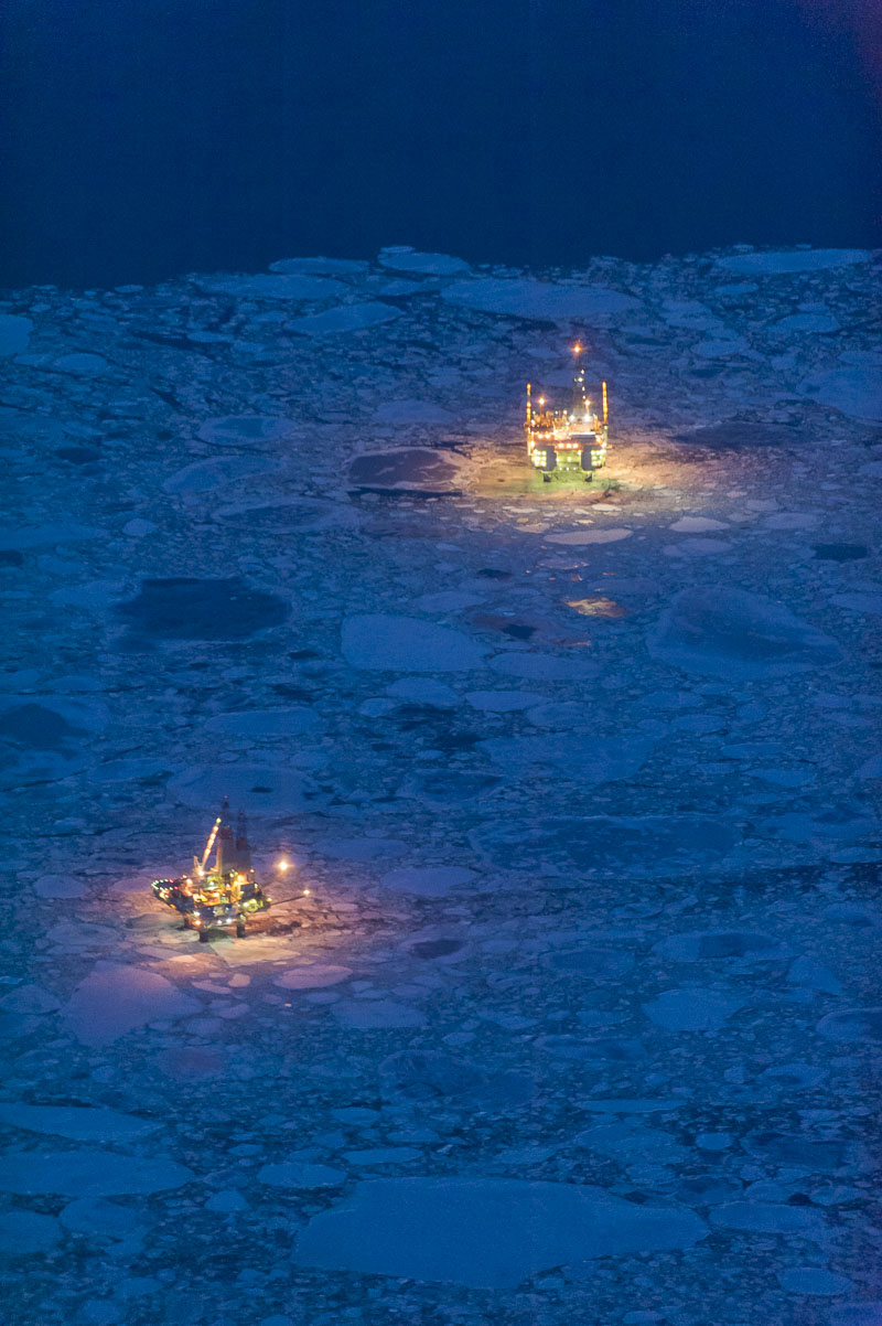 Aerial view of the Steelhead and Grayling, natural gas and oil platforms in Cook Inlet owned by Hilcorp, surrounded by floating...