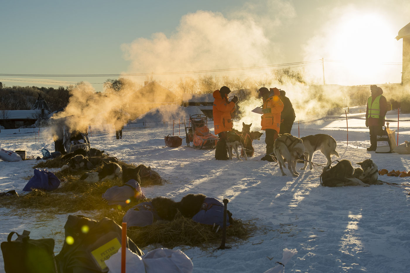 Steam rises up from cooking sites where mushers prepare meals for their teams at the Neiden 2 checkpoint for the 2019 Finnmarksl...