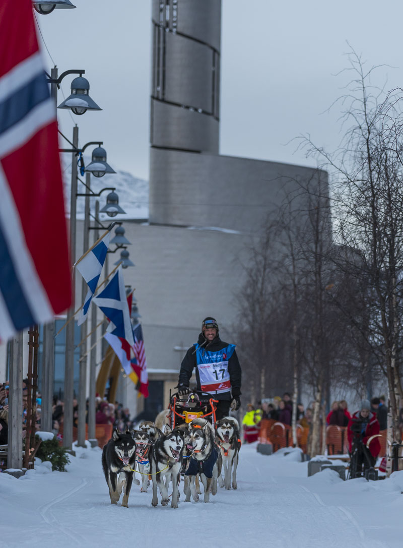 Thomas Wærner drives his winning team to the finish line in the city center of Alta, Norway, during the 2019 Finnmarksløpet...