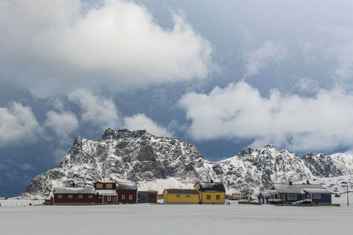 Colorful homes add variety to the winter tones at Uttalkeiv in the Lofoten Islands.