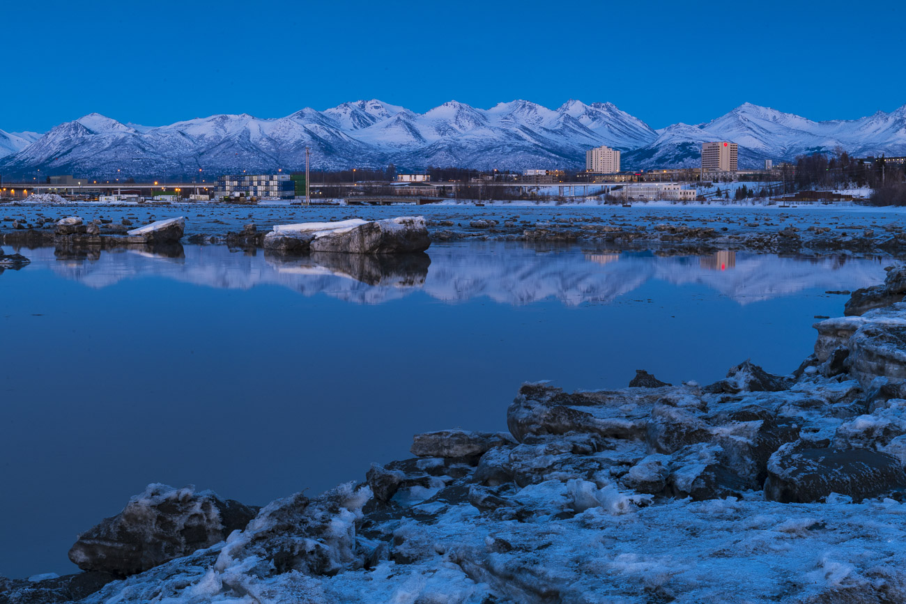 Most evening photos of Anchorage feature the downtown skyline, captured from an area near Point Woronzof on the western tip of...