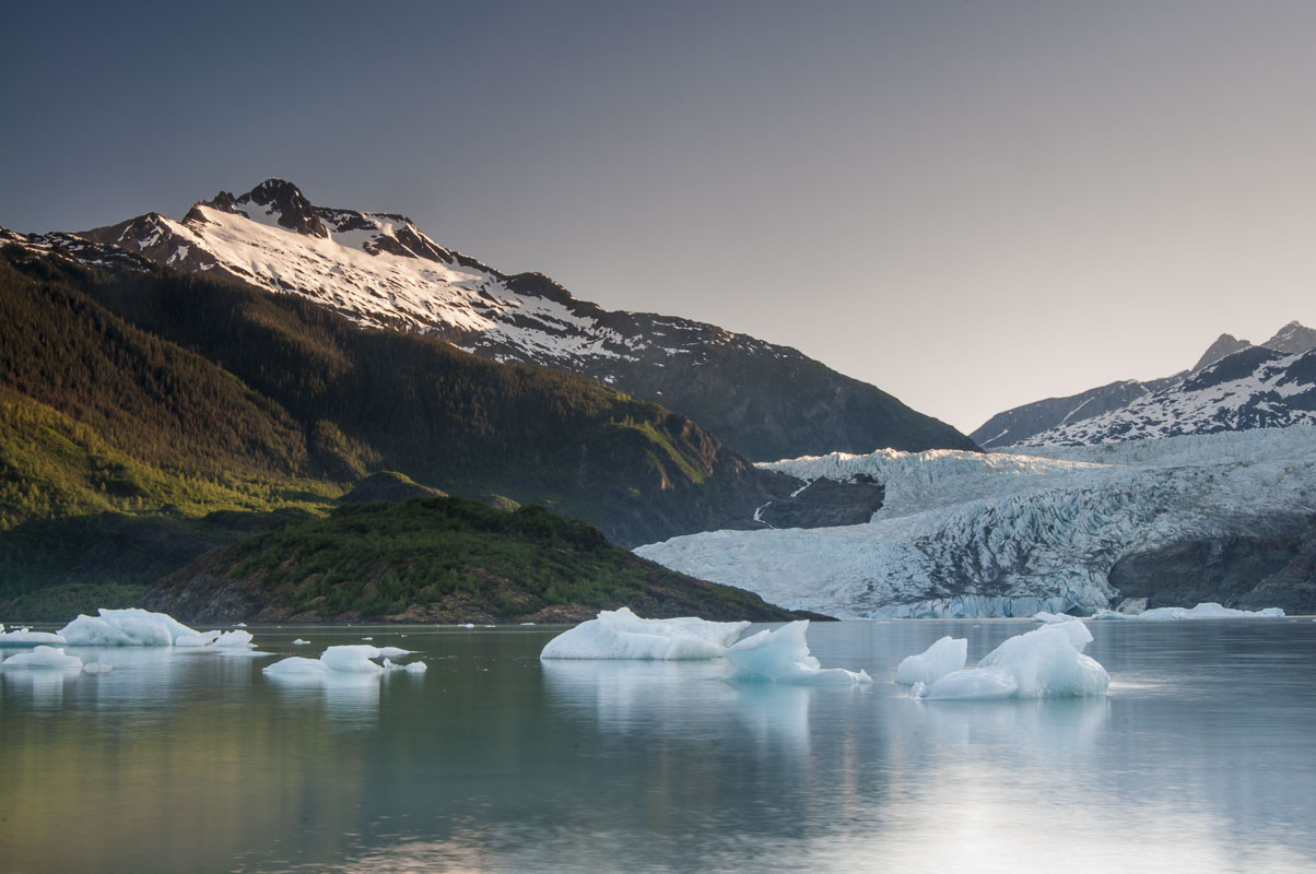 The Mendenhall Glacier flows down into its lake from the Coast Mountains in Tongess National Forest near Juneau, Alaska. The...