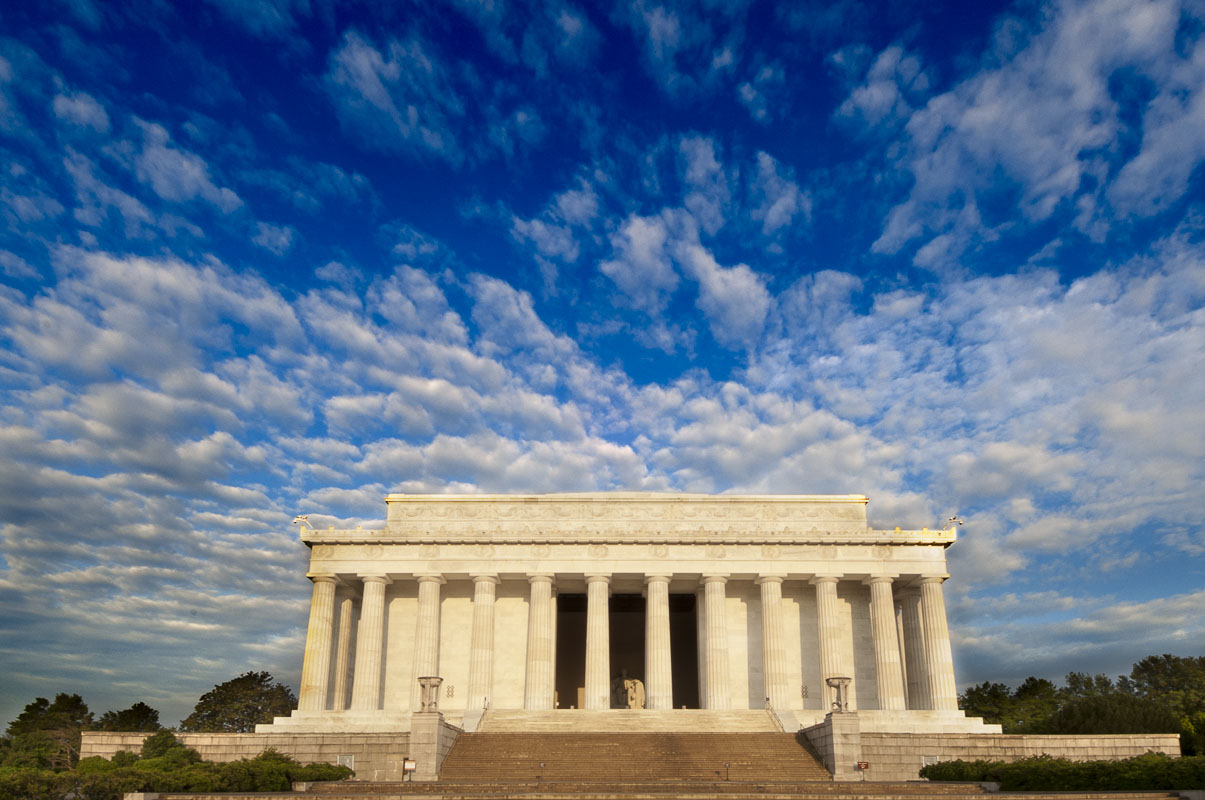 The first light of the day strikes the front of the Lincoln Memorial in Washington, D.C.