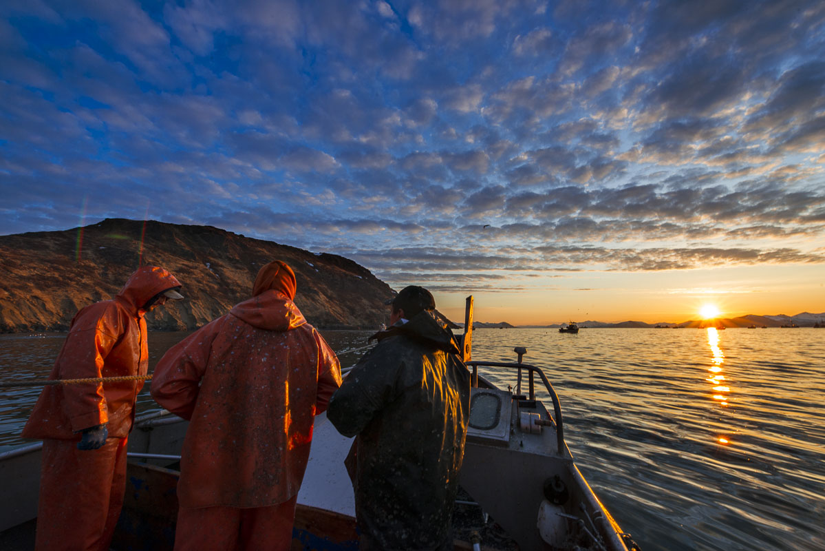 The sun rises over Kulukak Bay in the Bristol Bay region as a commercial fishing crew and skipper prepare for another day of...