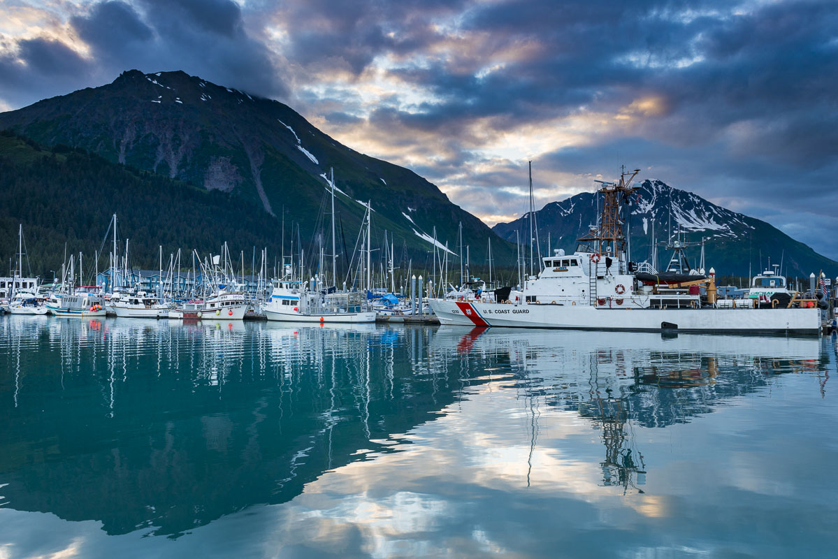 It is after 10:00 p.m., but the sun is still up and lighting up the sky above the Seward small boat harbor in mid-summer.