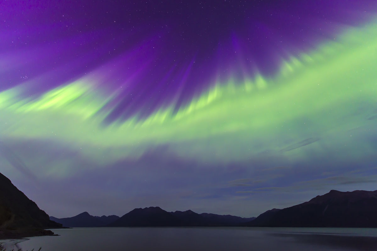 During a mid-August display of the aurora borealis, I was out chasing the lights in south Anchorage and along the Turnagain Arm...
