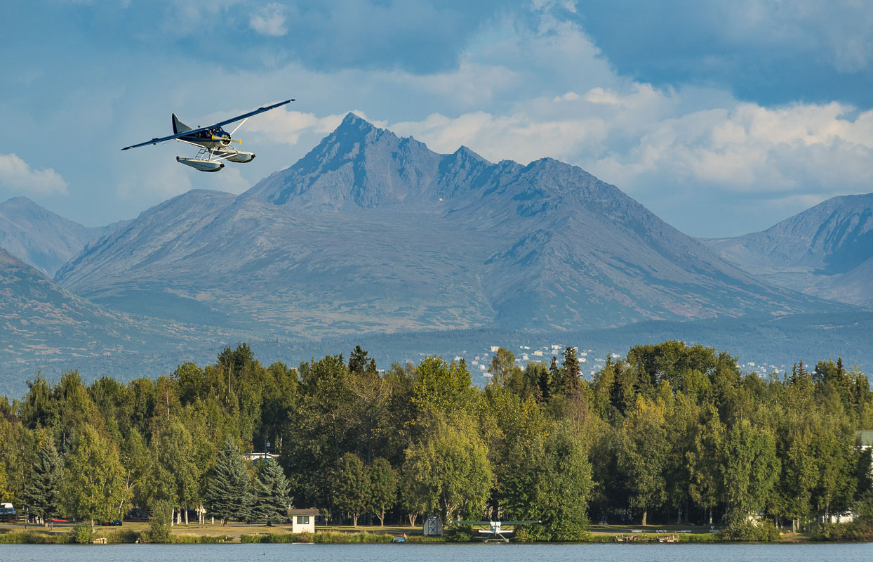 A DeHavilland Beaver comes in for a landing at the Lake Hood Seaplane Base in Anchorage.