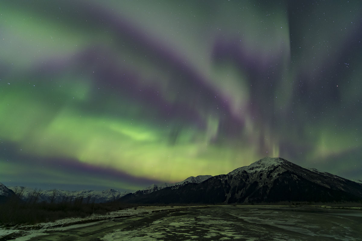Aurora borealis over the Chugach Mountains along the Twenty Mile River, Chugach National Forest.