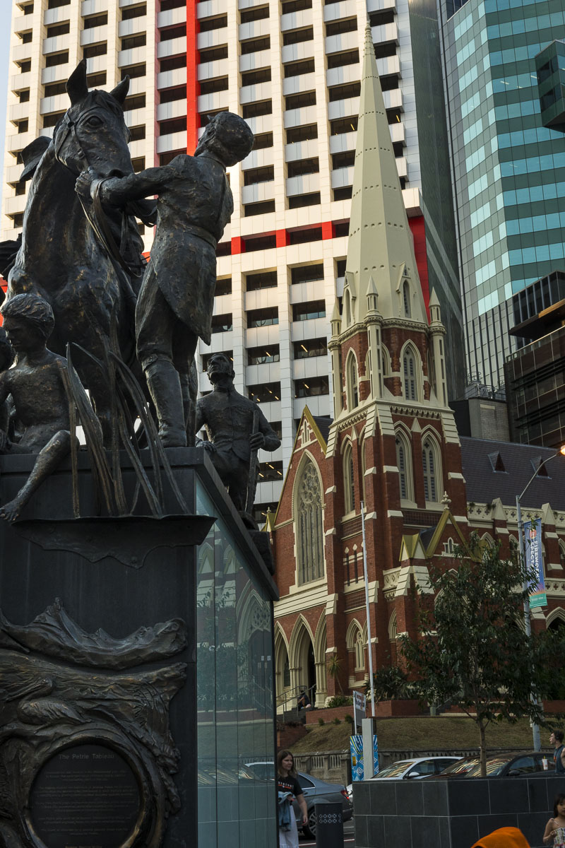 A blend of architecture and statues add diversity to downtown Brisbane, Australia.