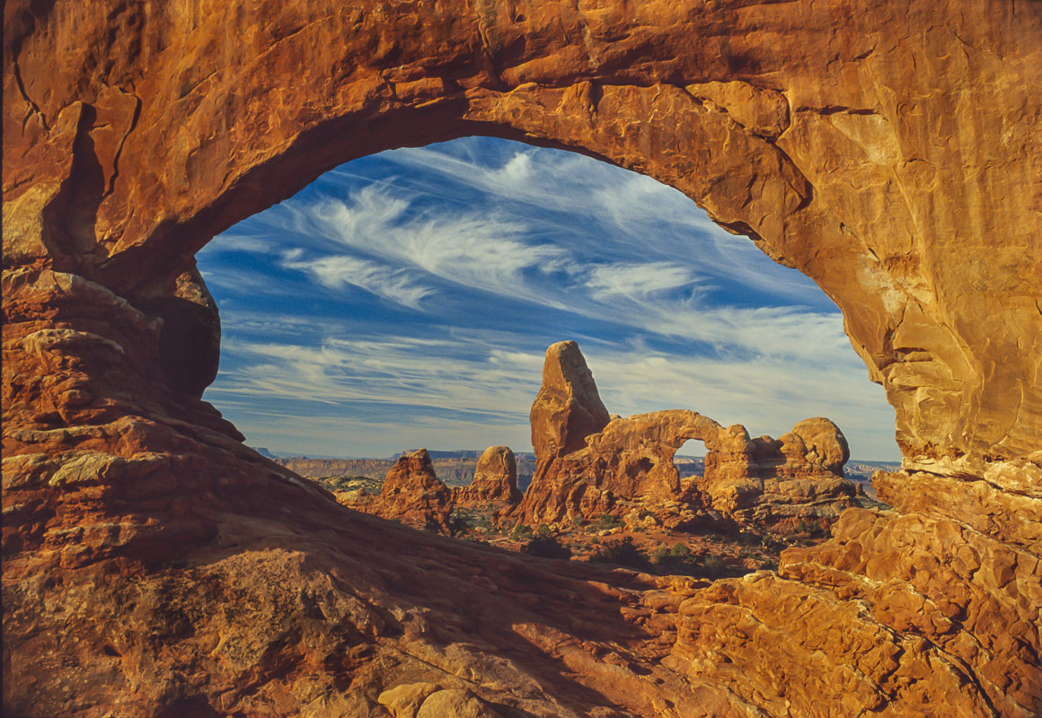 This is one of the classic landscape photos of the American Southwest, a view through the North Window Arch at the Turret Arch...