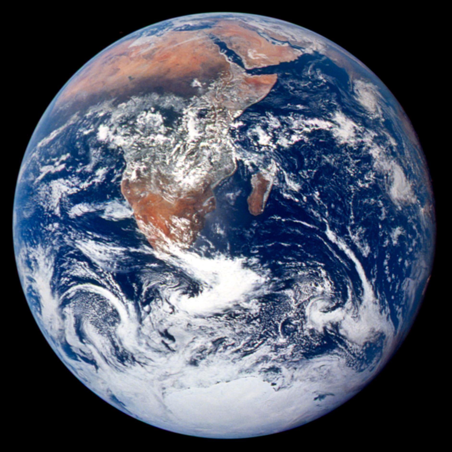 Astronaut photograph AS17-148-22727, the first "Blue Marble" photo,  taken on December 7, 1972 during the Apollo 17 mission....